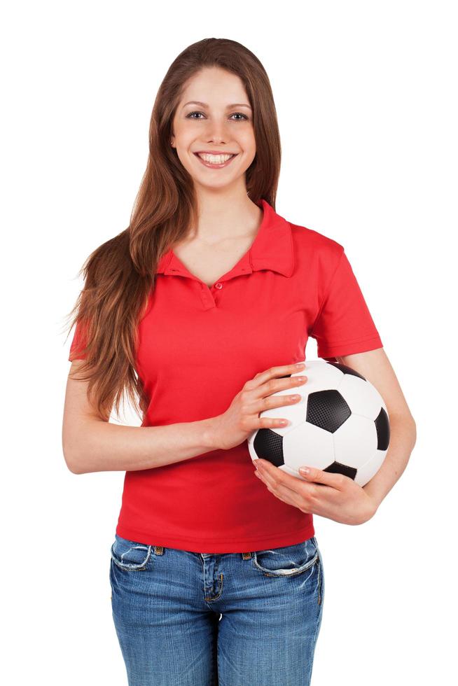 linda chica sosteniendo un balón de fútbol foto