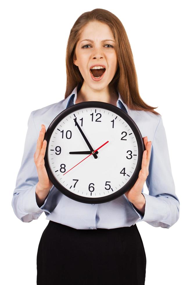 Yawning woman holding a large hours photo