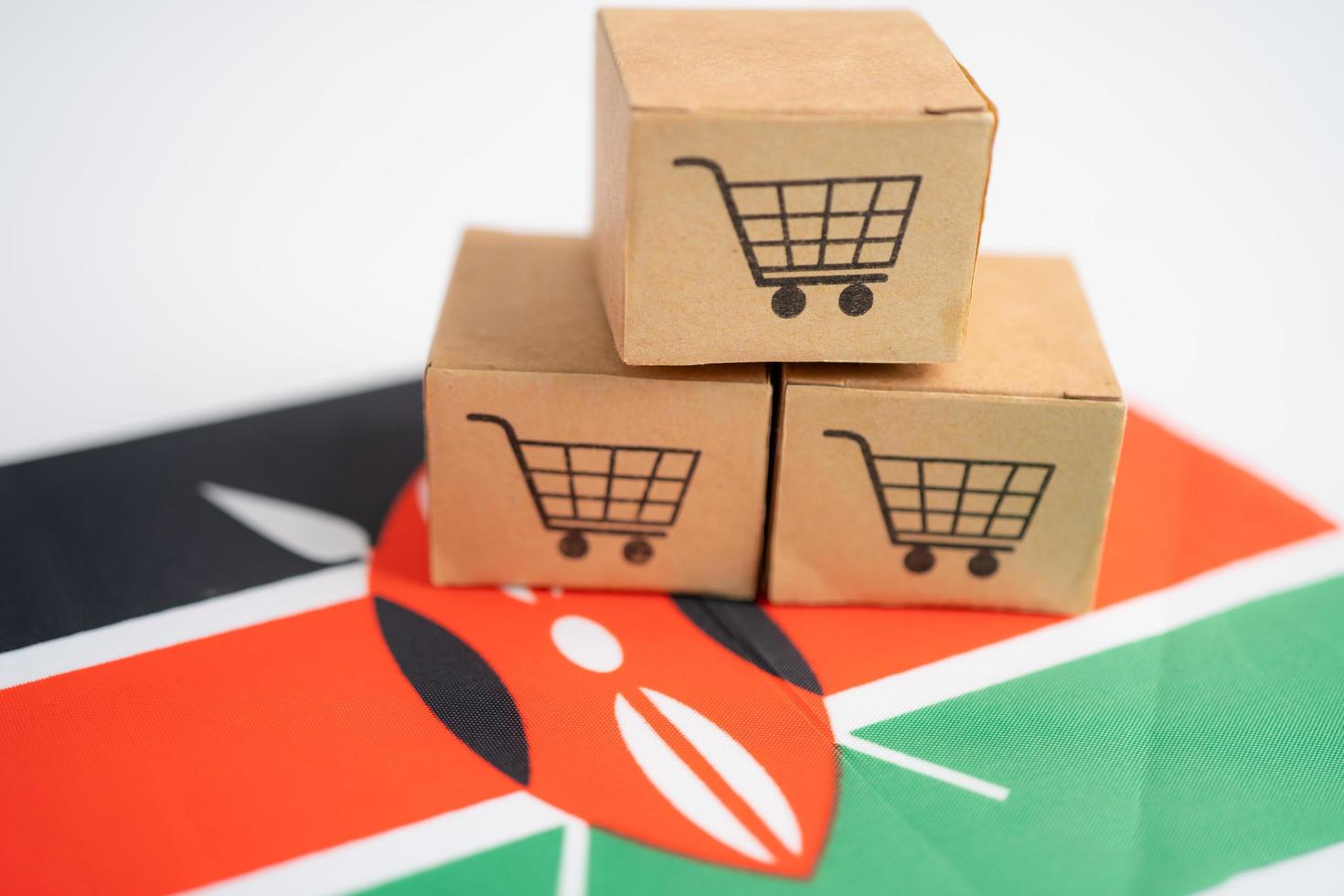 logotipo de carrito de compras con la bandera de kenia, foto