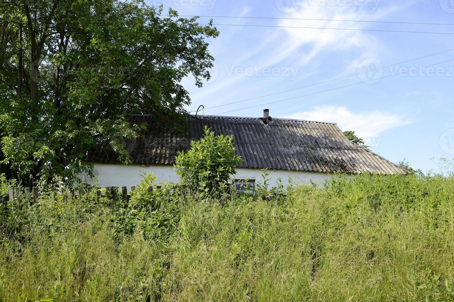 Beautiful old abandoned building farm house in countryside photo