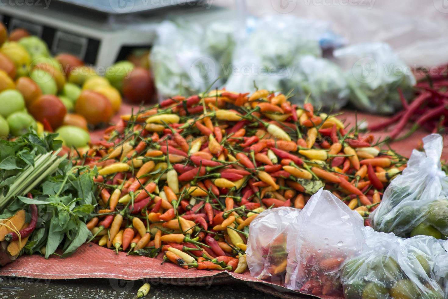 A bunch of cayenne pepper on seller's stall photo