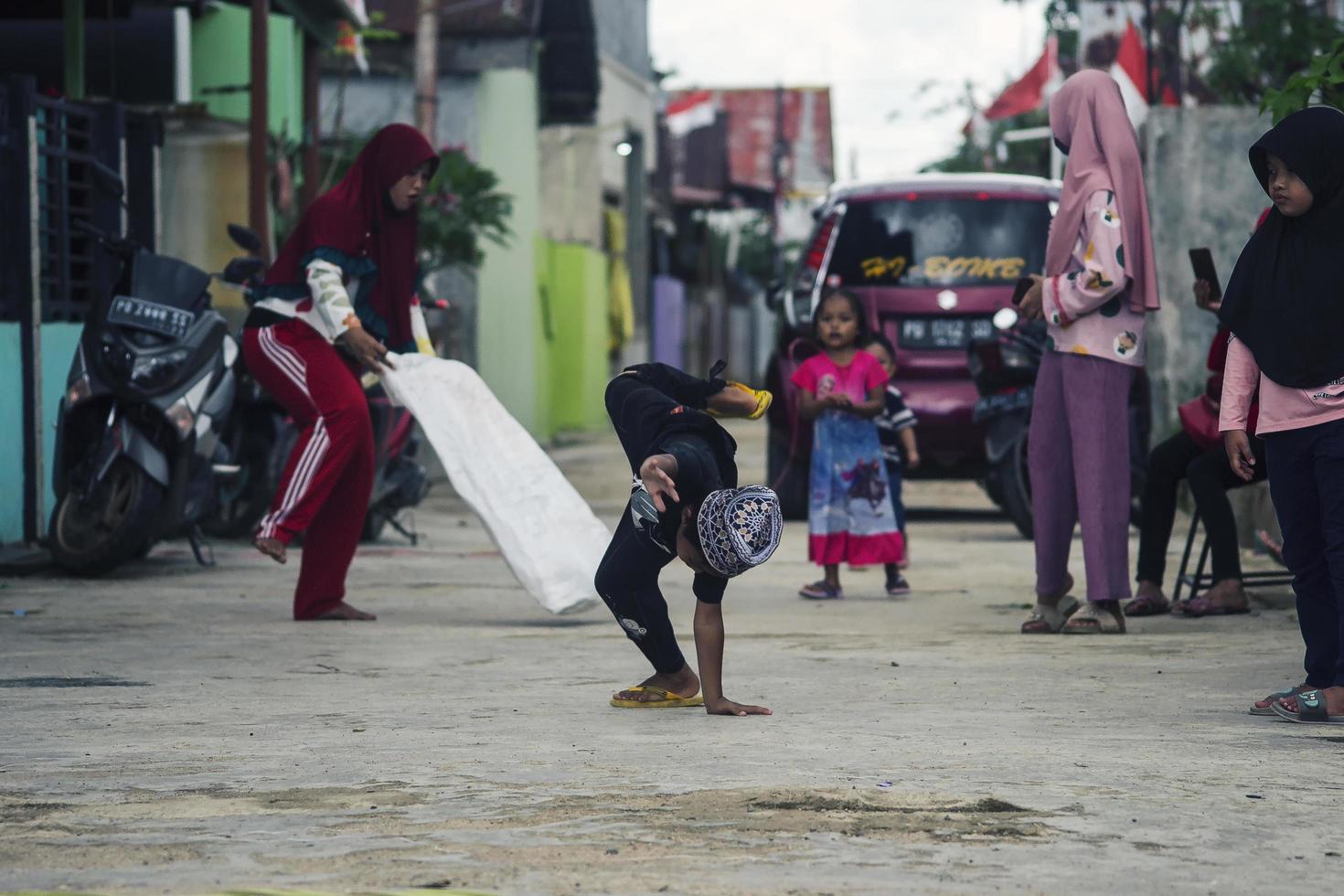 Sorong, Papua, Indonesia 2021- People celebrate Indonesia's independence day with various competitions photo