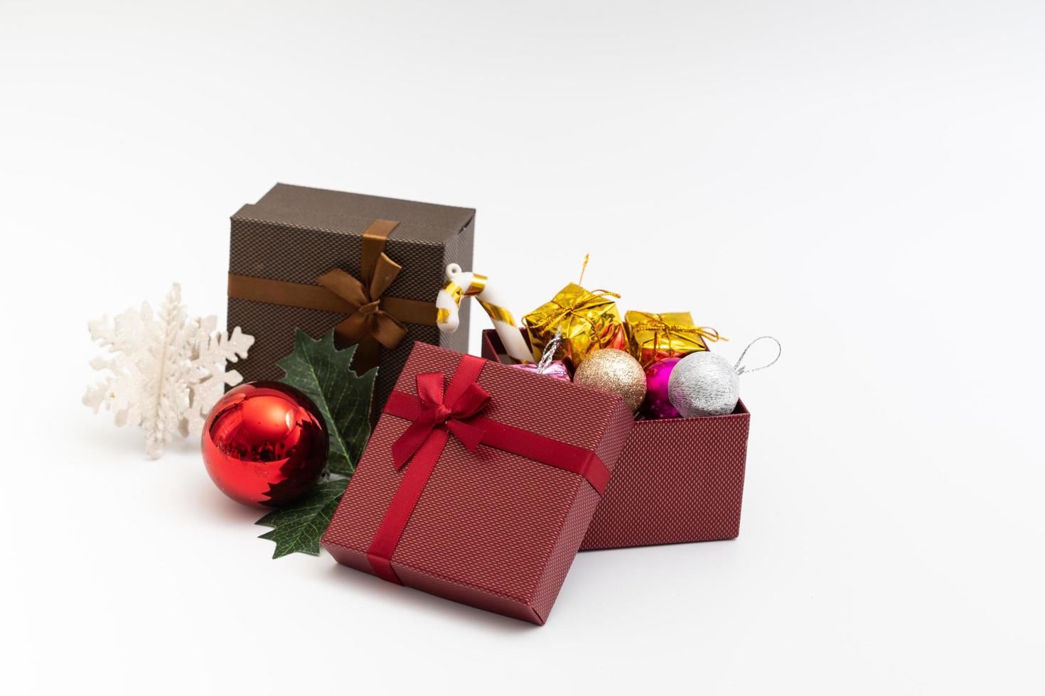 present box with color ribbon on white background photo