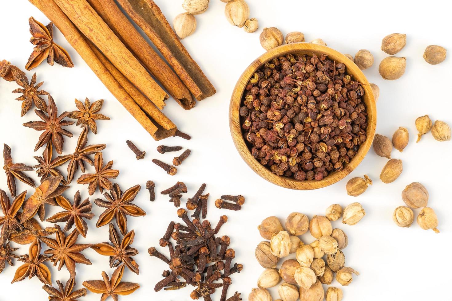 Assorted colorful spices on a white background. photo