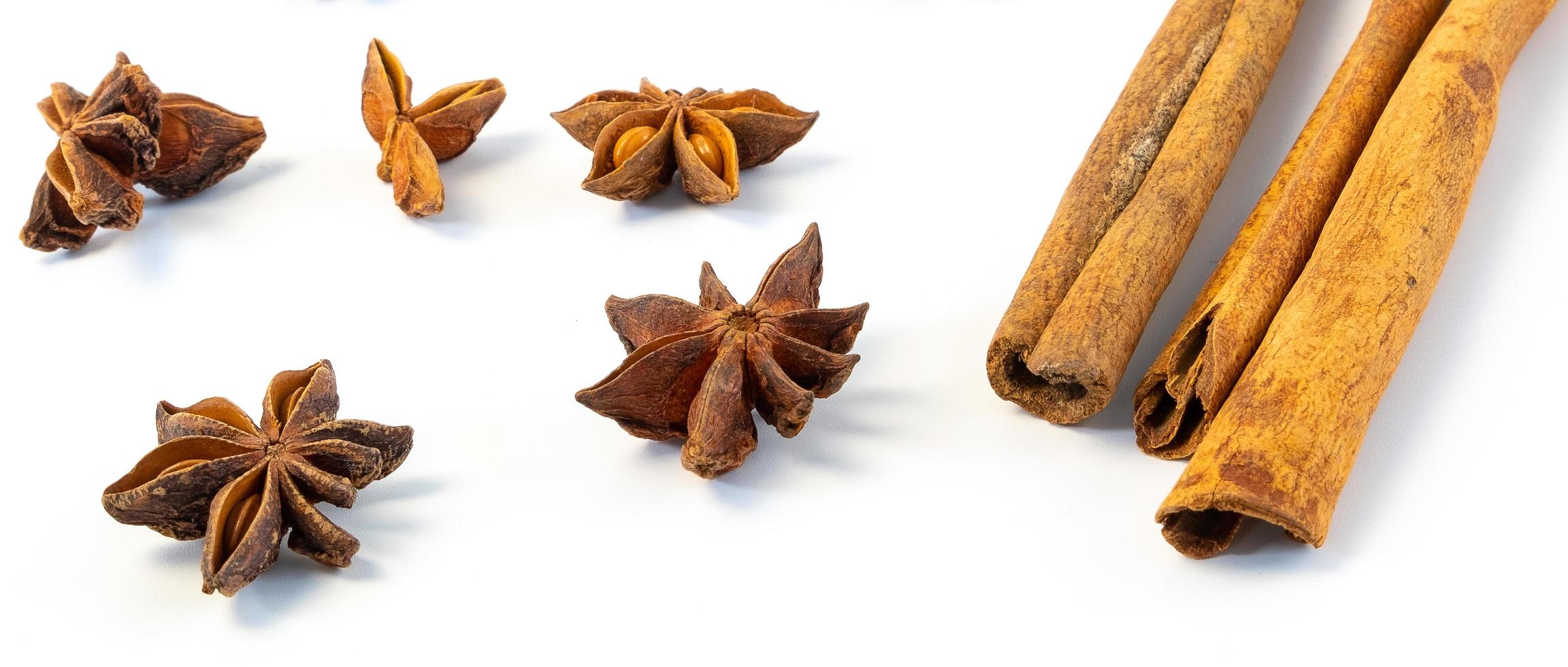 Assorted colorful spices on a white background. photo