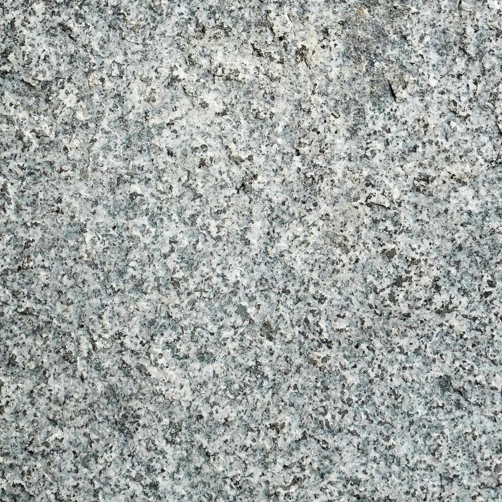 Dark gray granite stone texture. photo