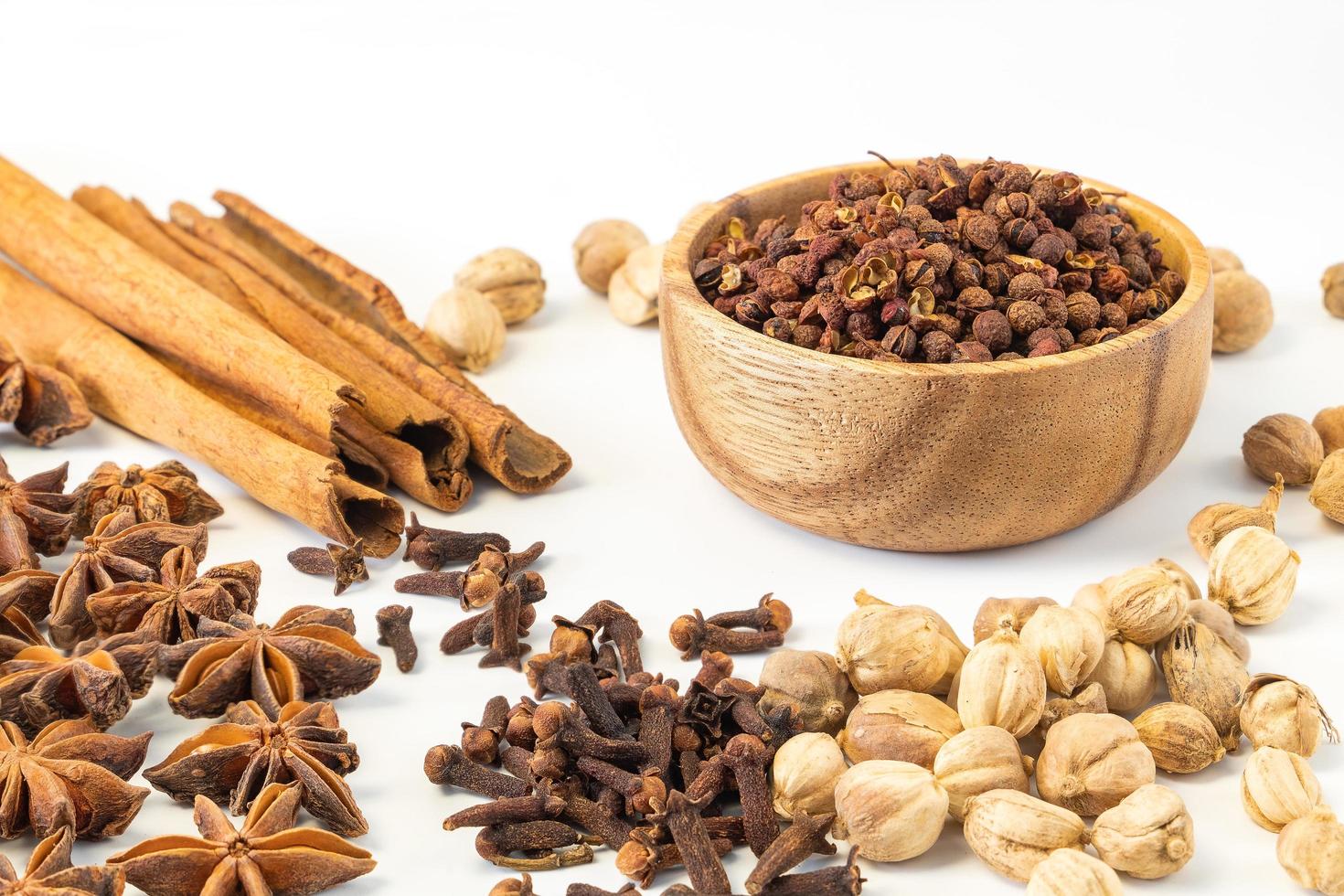 Assorted colorful spices on a white background. photo