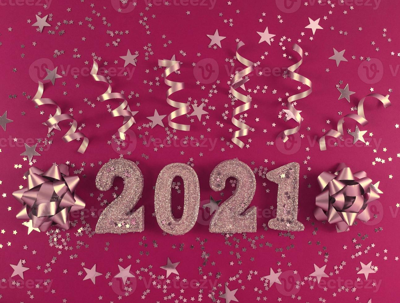 Greeting card of New Year 2021. Glittered figures, stars, bows photo