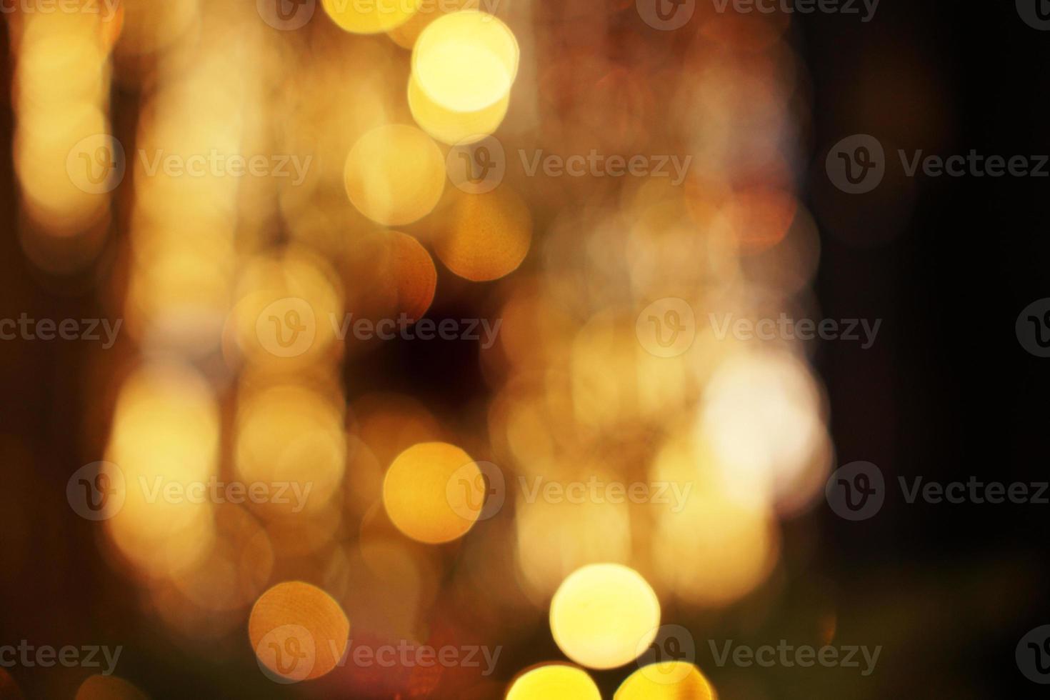 Abstract background of blurred lights with bokeh effect photo
