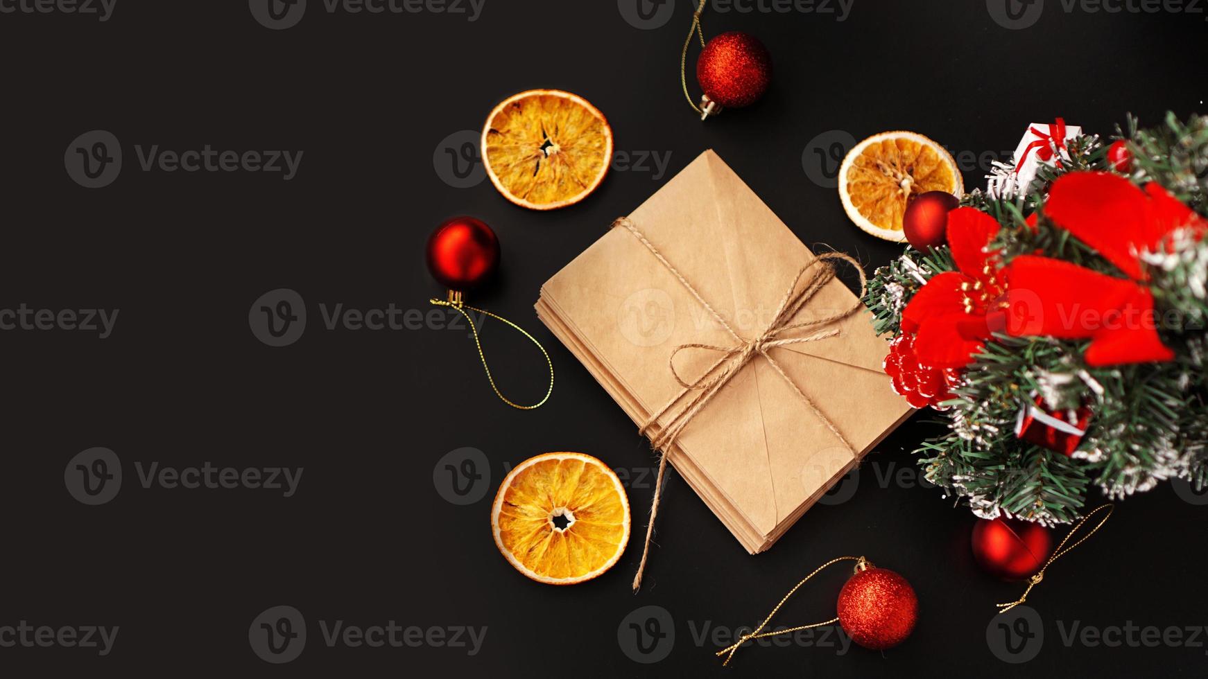 Christmas composition. Xmas festive decoration on black background photo