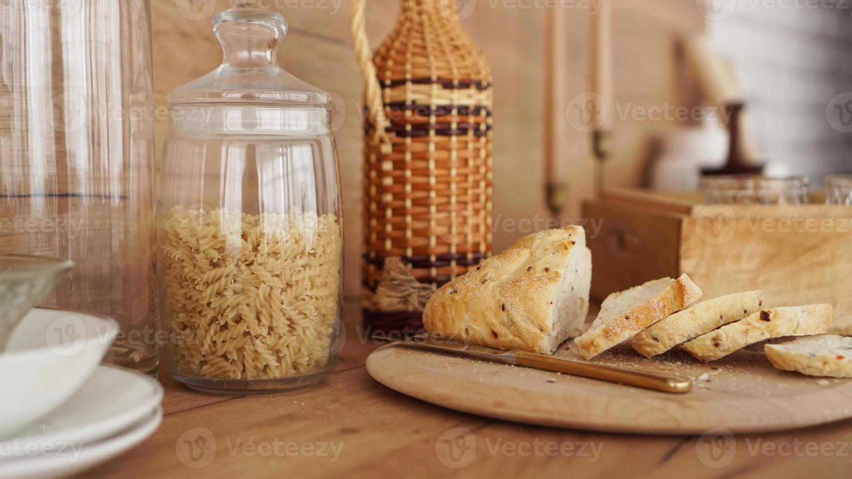 Sliced white bread on a wooden tray. Modern Scandinavian style kitchen photo