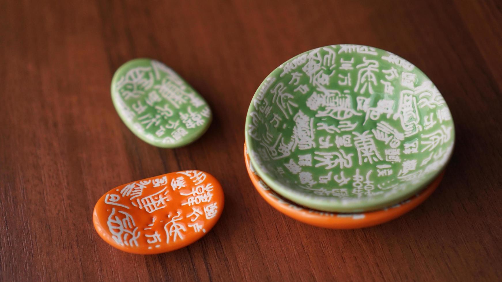 Set of empty ceramic dishes and stands for sushi photo