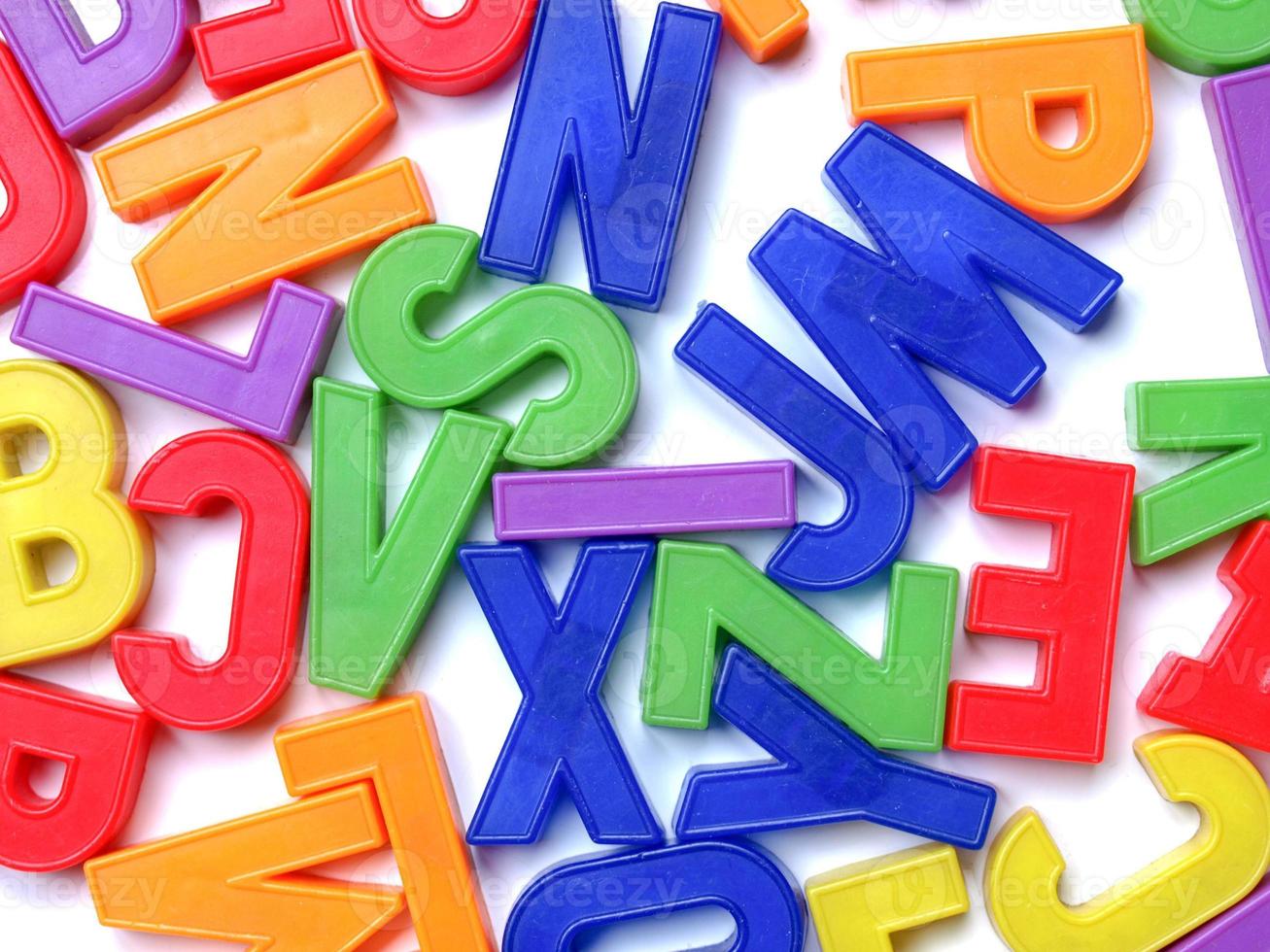 Plastic letters over white 3281649 Stock Photo at Vecteezy