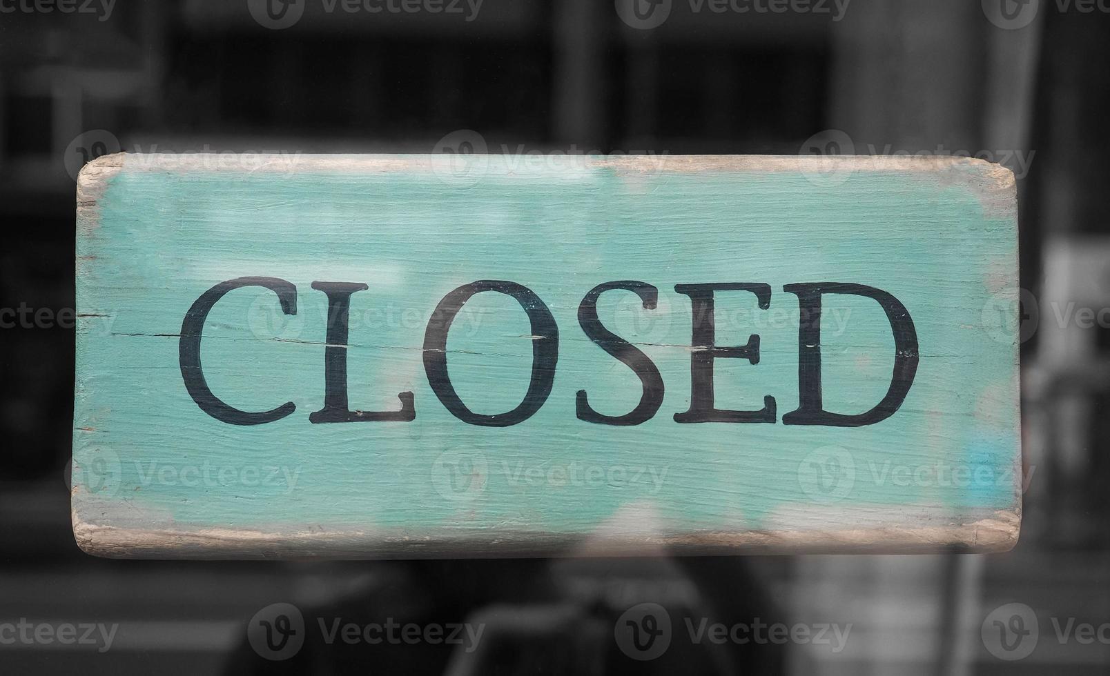 Closed sign, blurred background photo