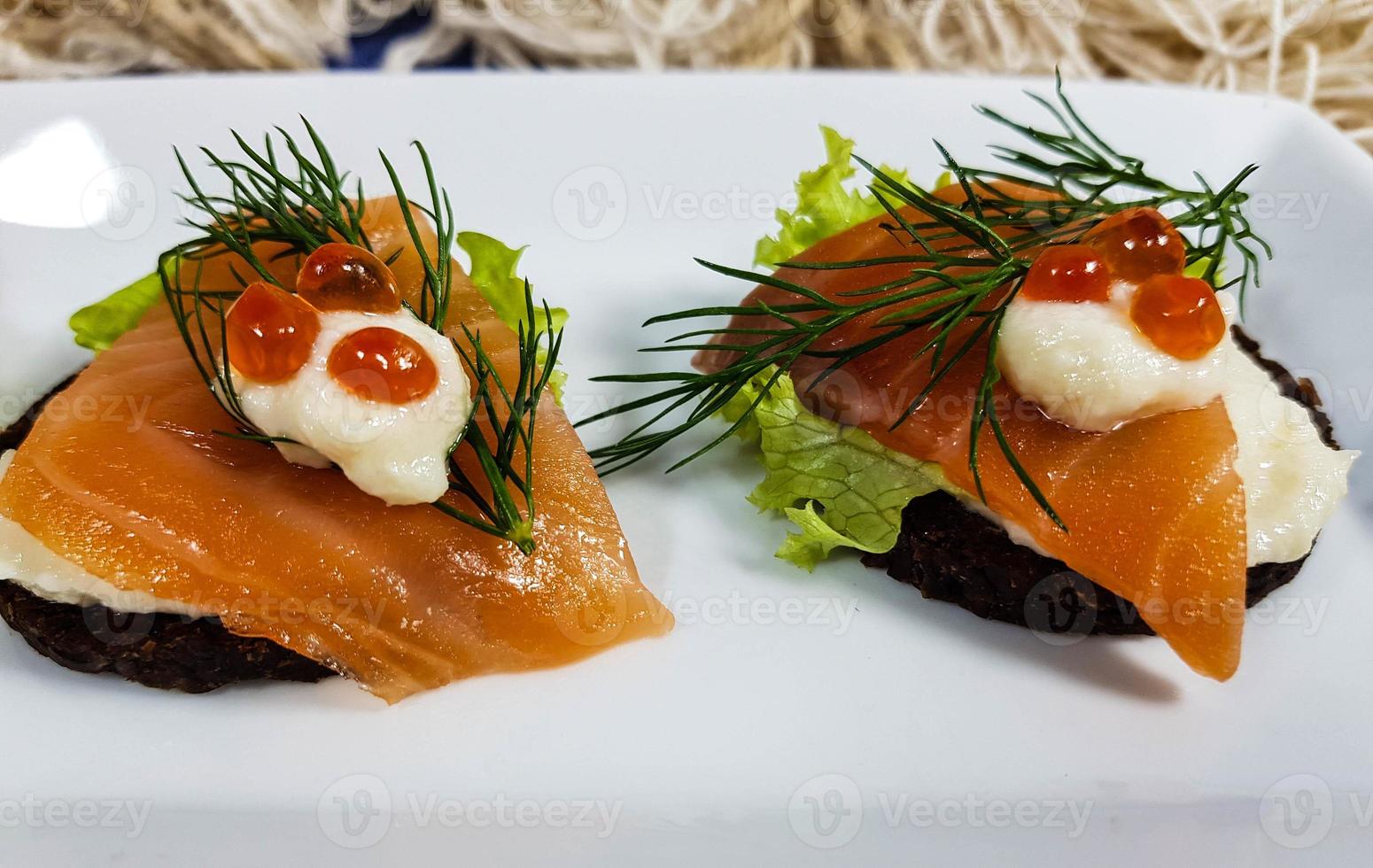 Smoked fish different canapes photo