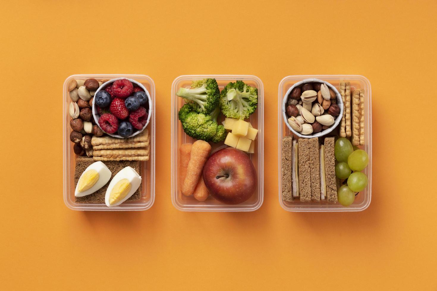 Healthy food boxes arrangement top view 3286920 Stock Photo at Vecteezy