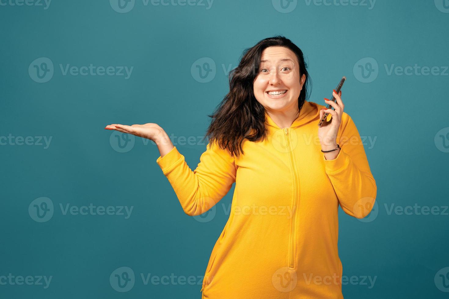 Happy plus size positive woman in studio photo