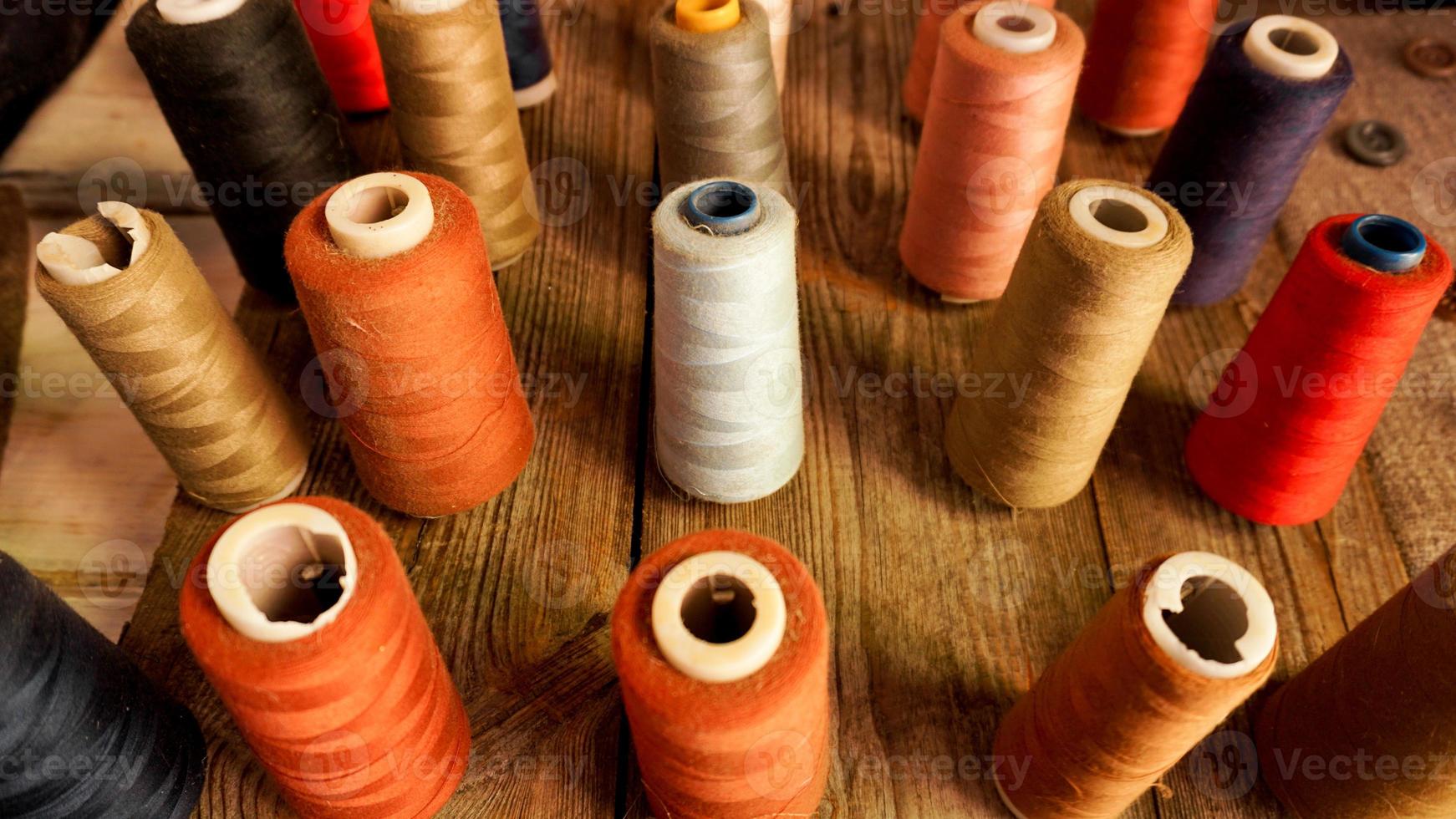 Skeins of thread. Sewing workshop. Multicolored threads photo