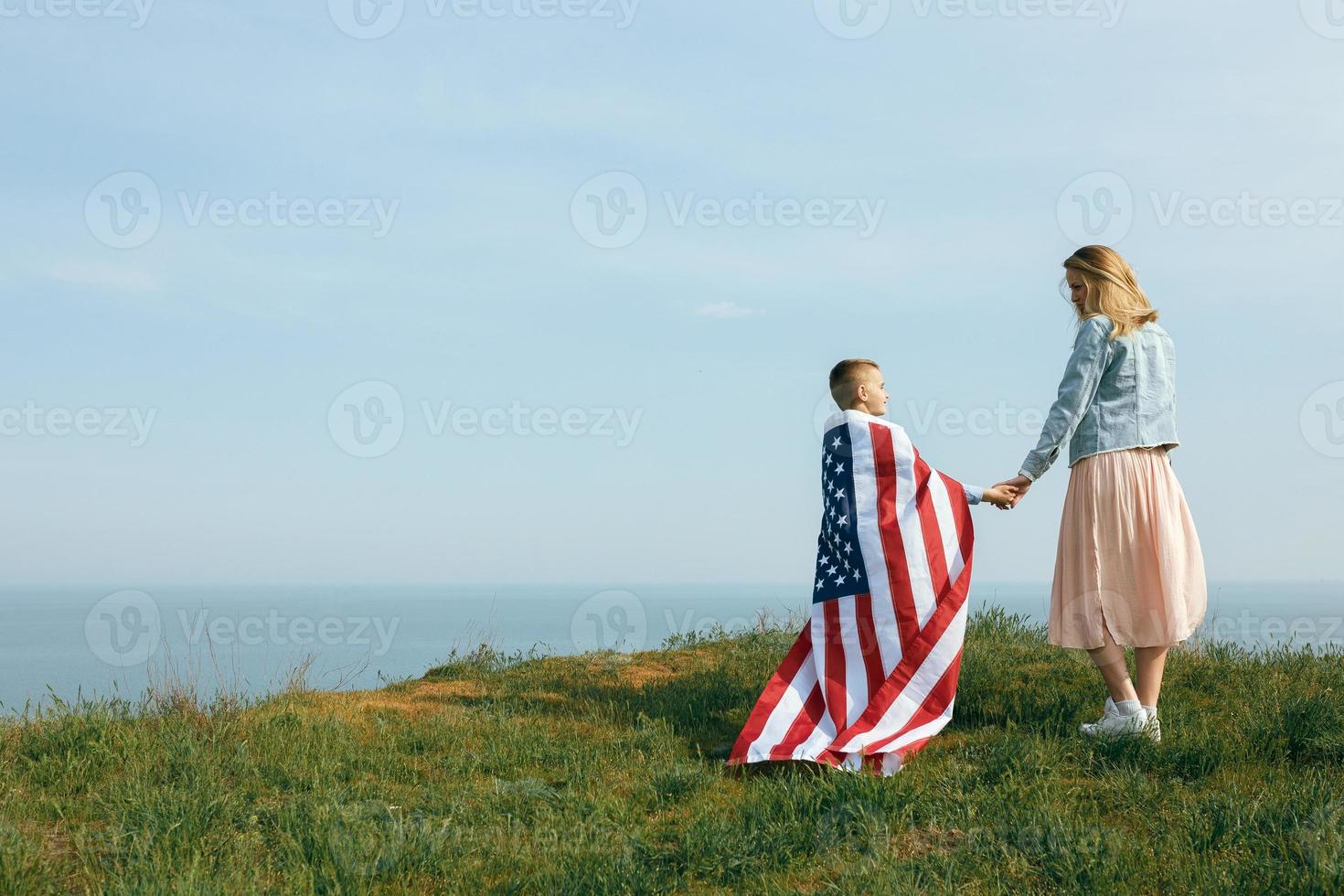 Single mother with son on independence day of USA photo