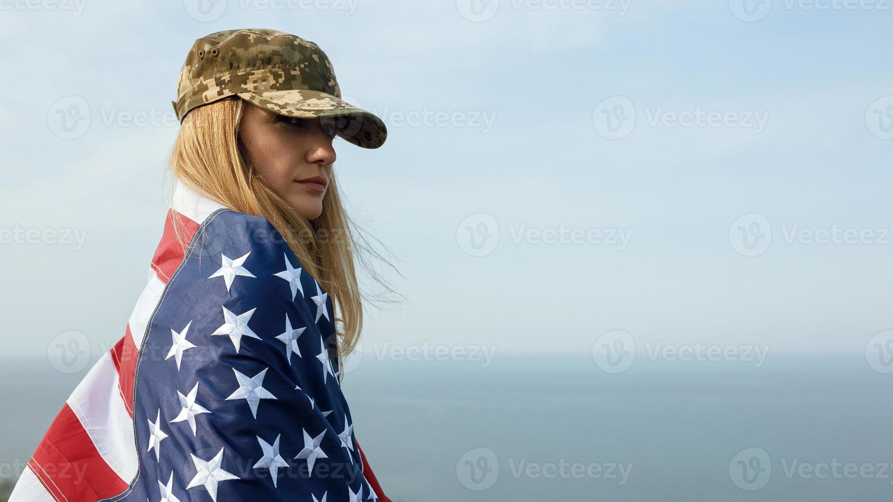 Civilian woman in her husband's military cap photo