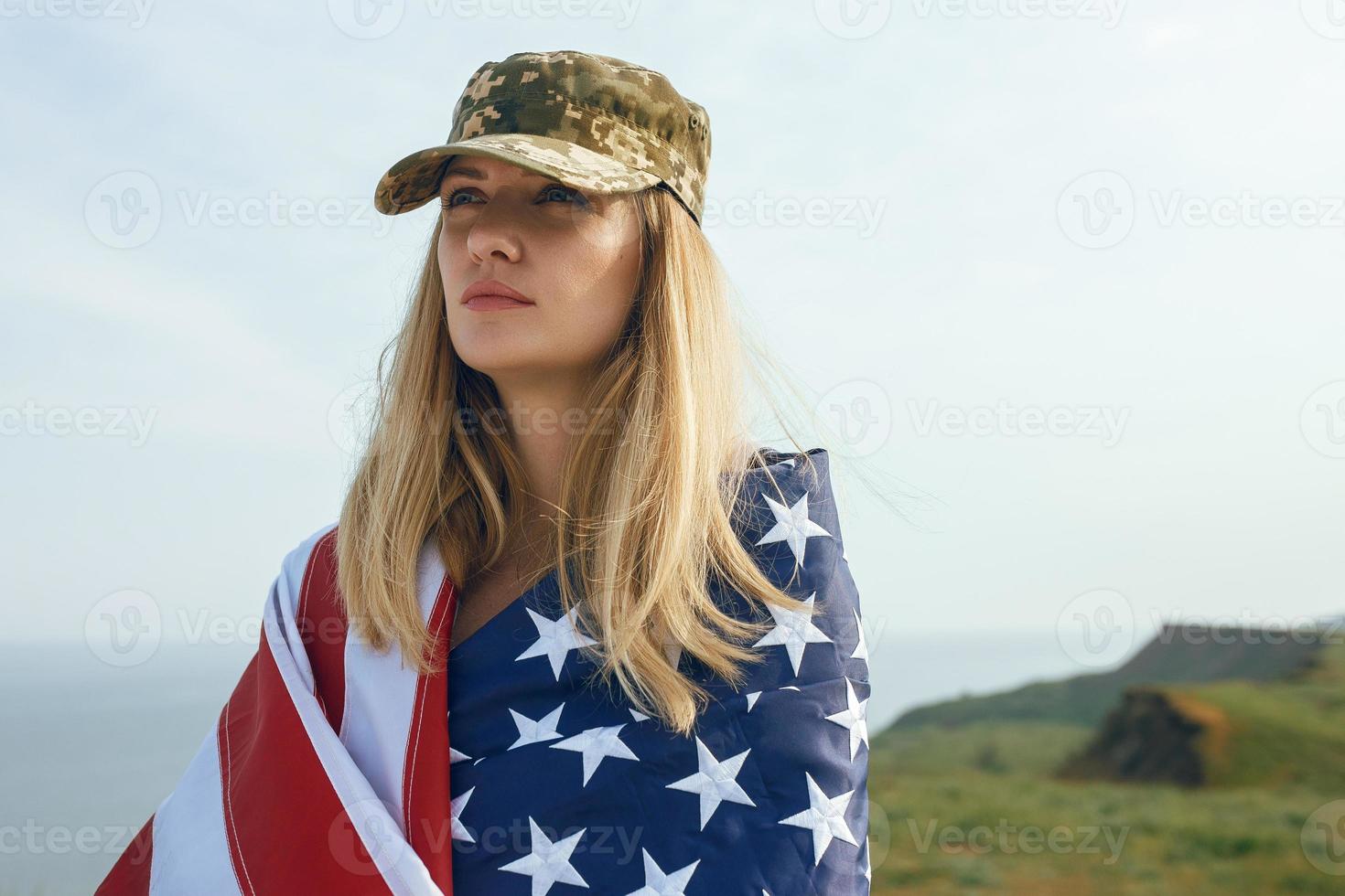 Civilian woman in her husband's military cap photo