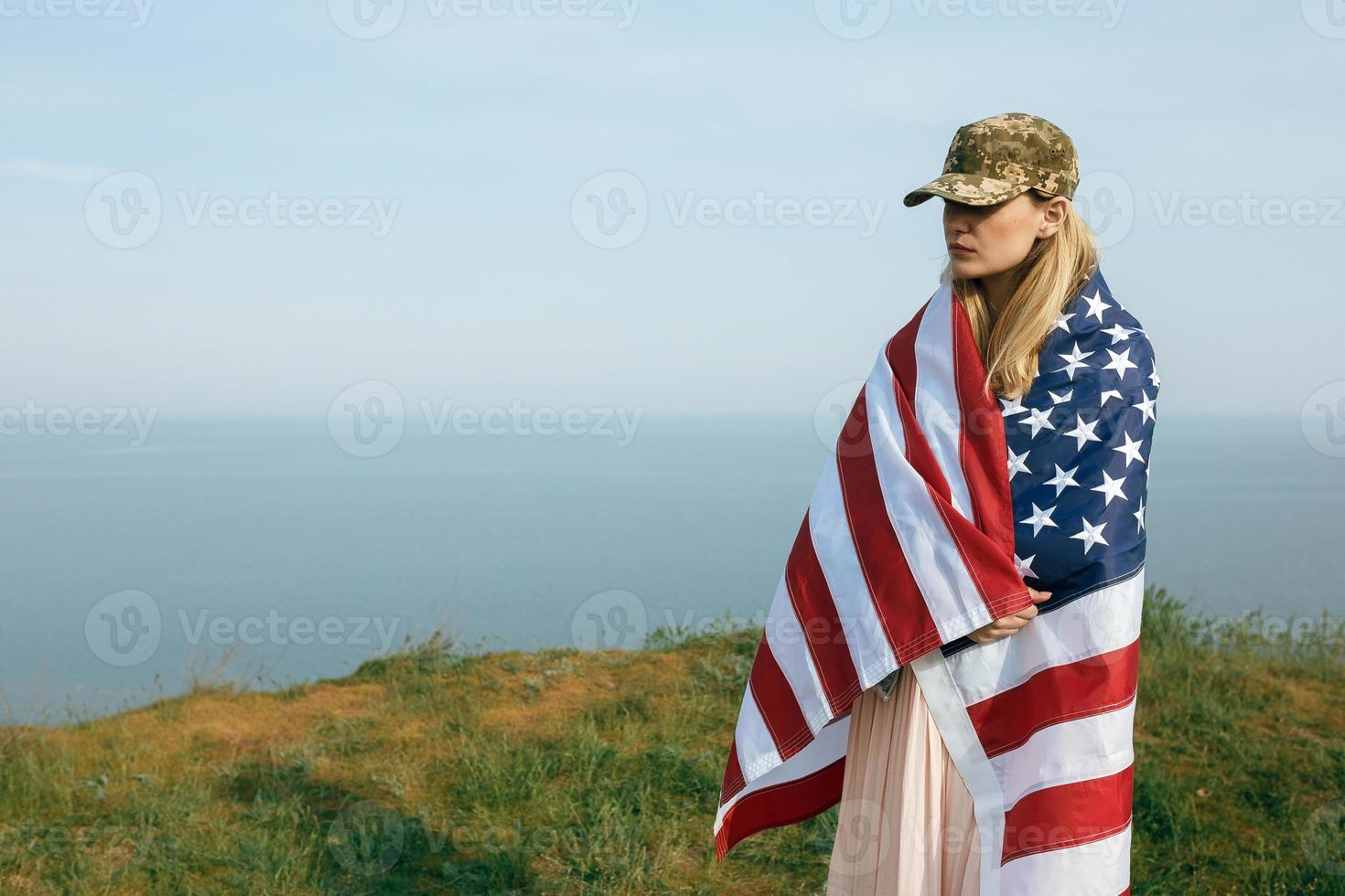 Civilian woman in her husband's military cap photo