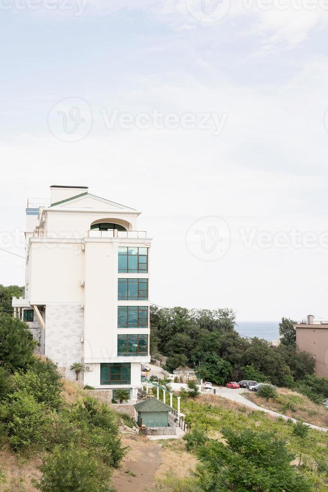 Hotel or apartment building on the seaside photo