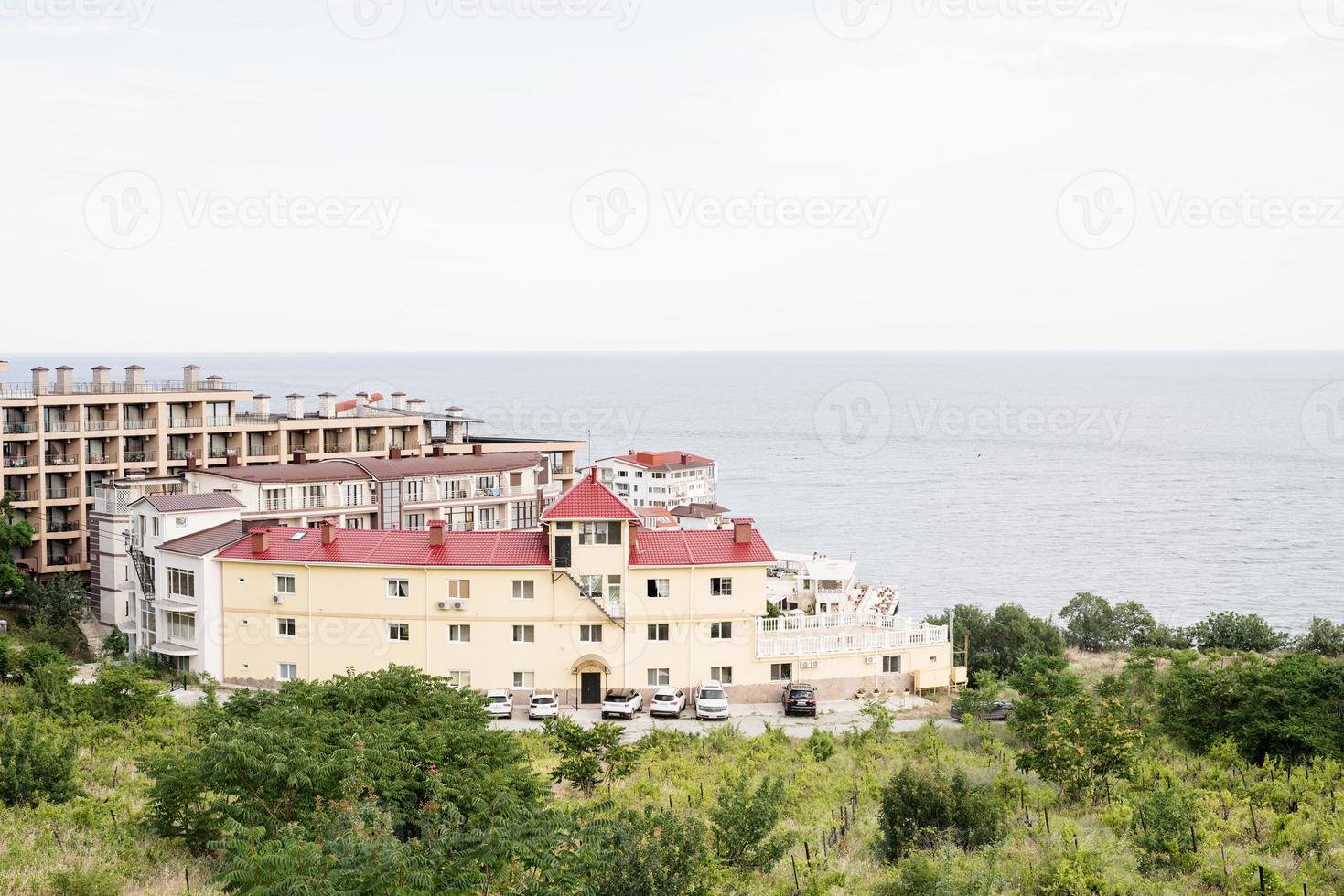 Hotel or apartment building on the seaside photo