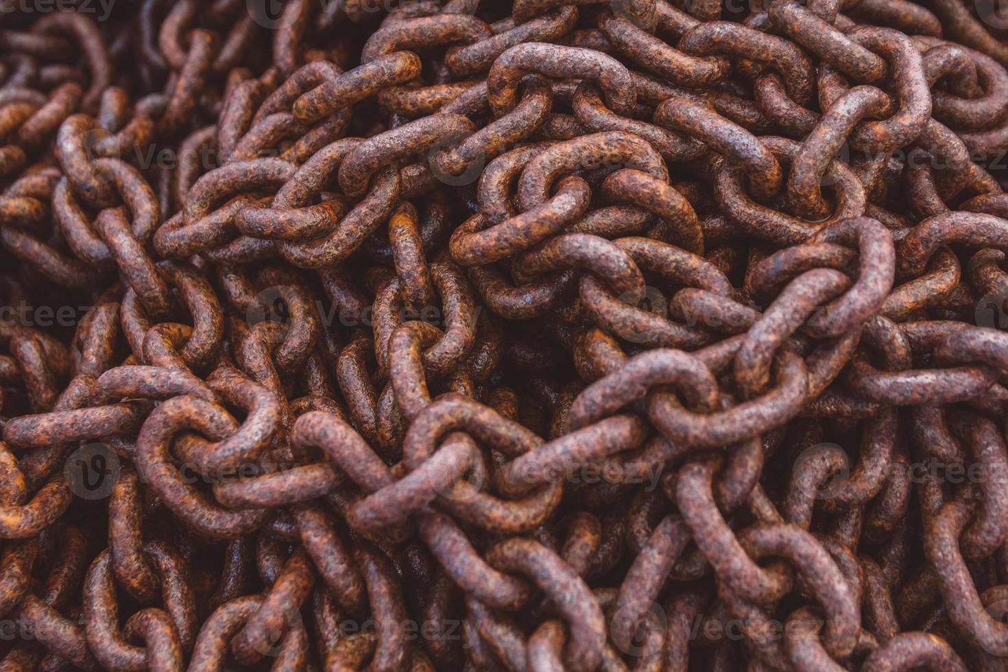 Abstract of Thick Rusty Chain Background Image photo