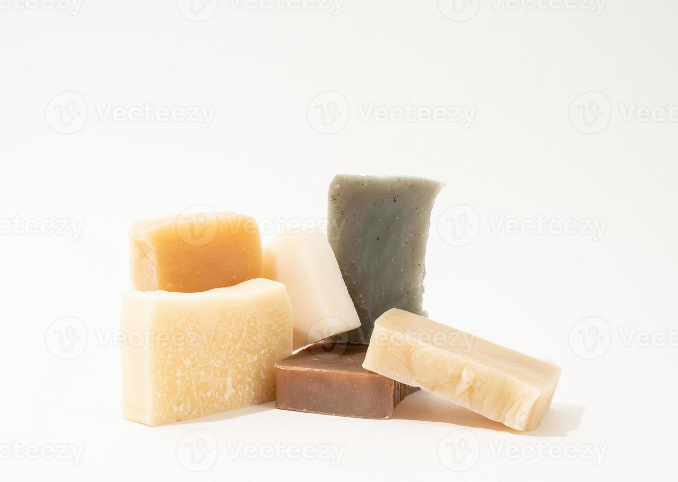 Stack of hand made soap on white background photo