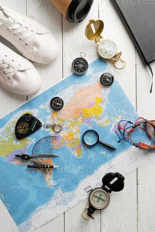 Top view map of the world with various compasses. Planning a trip 3295081 Stock Photo at Vecteezy