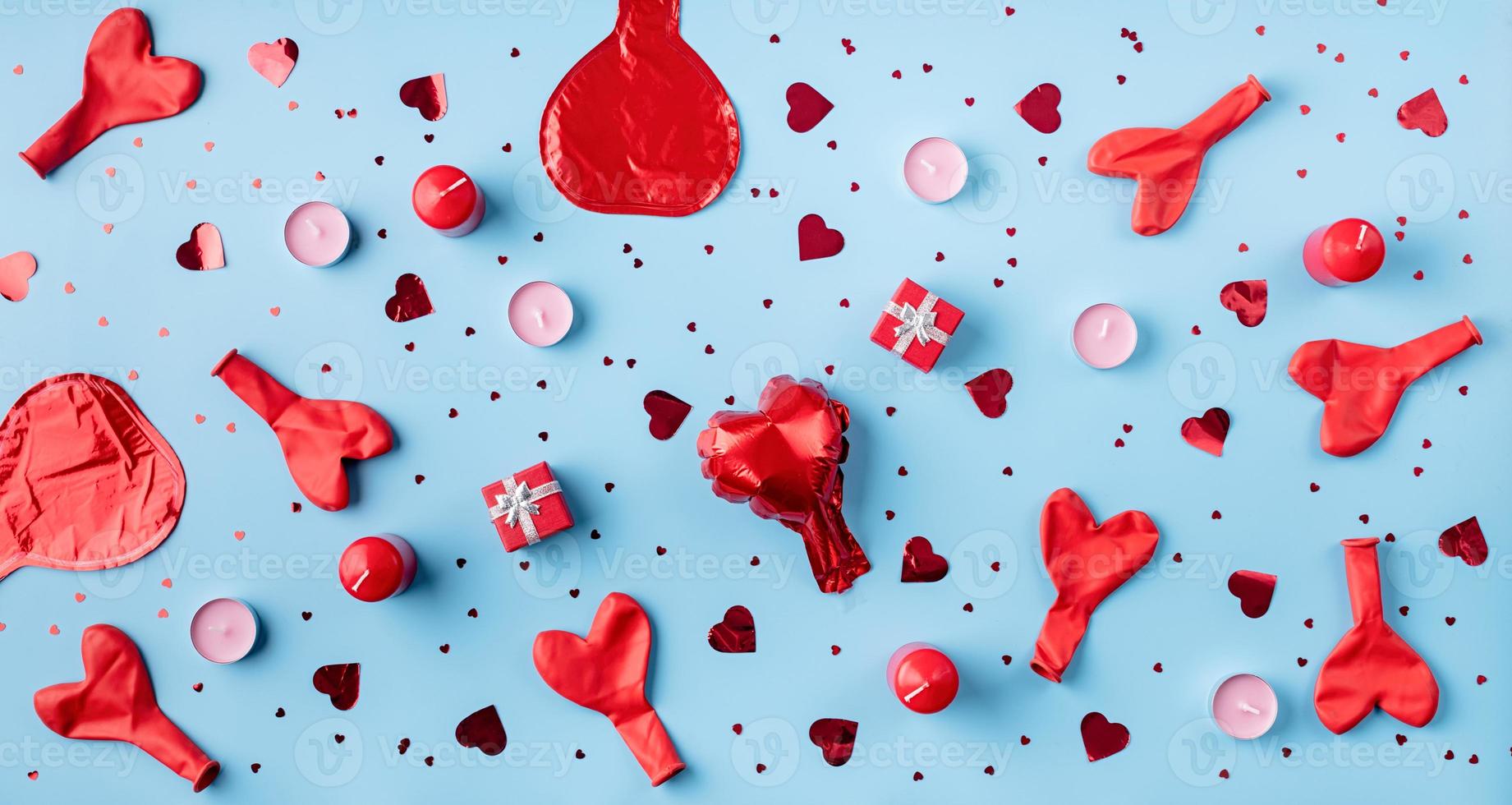 Top view of valentines day pattern on blue background photo