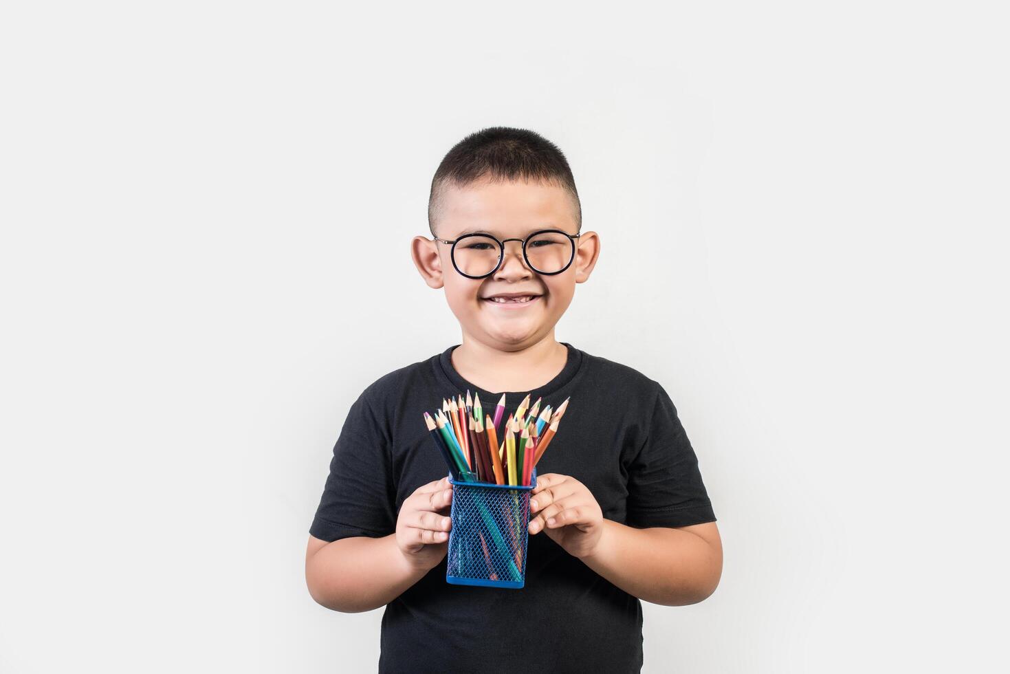 Educatoin boy smiling in studio shot photo