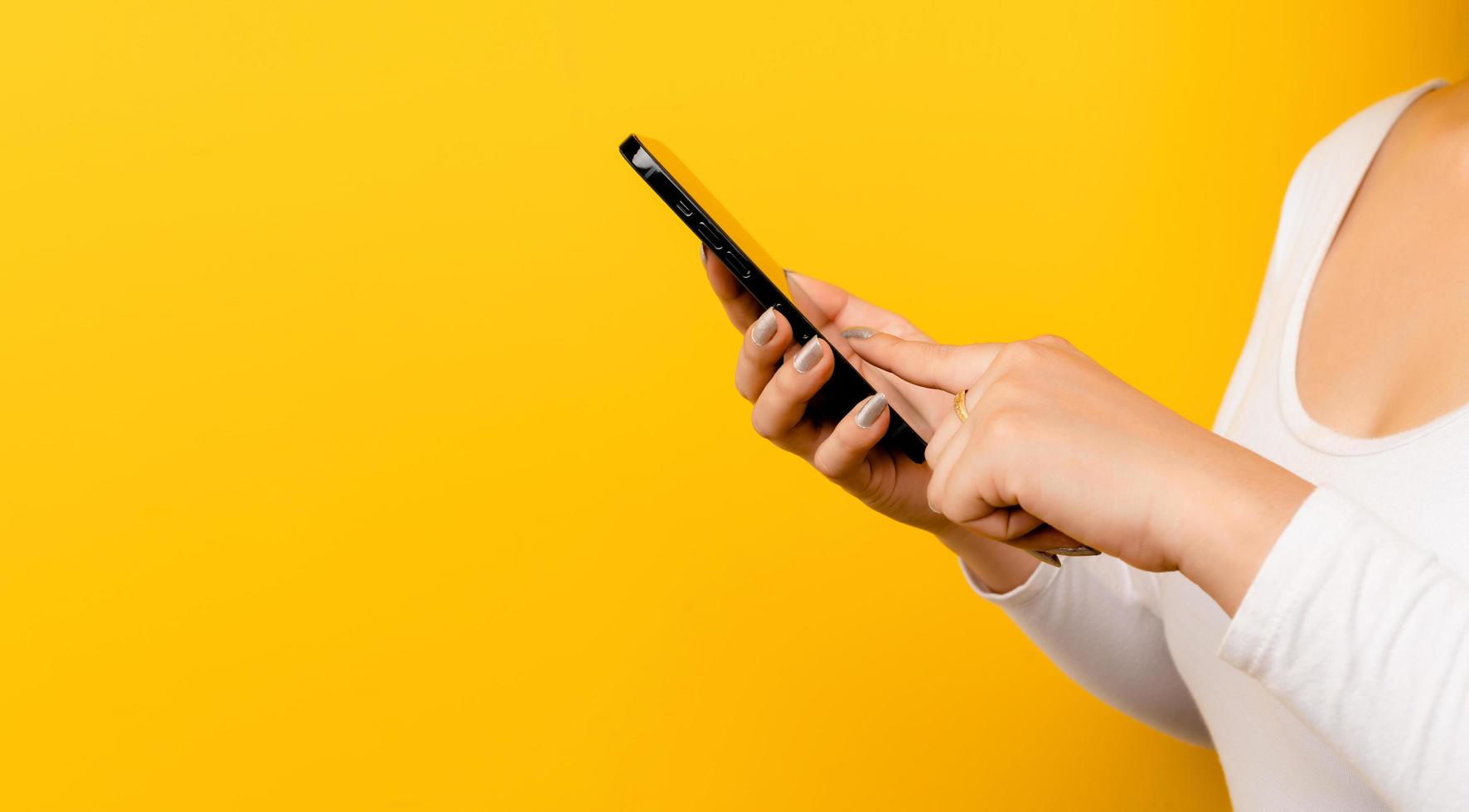 Close-up online communication Asian woman using a smartphone photo