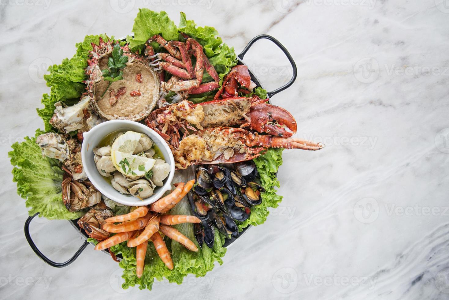 Mixed fresh Portuguese seafood selection gourmet set platter meal on the table photo