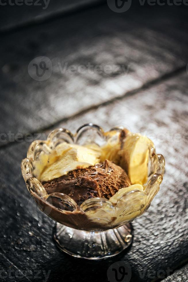 Classic chocolate and vanilla ice cream in bowl photo