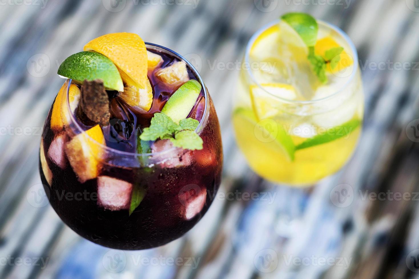 Red and white wine sangria cocktail drinks on table outside photo