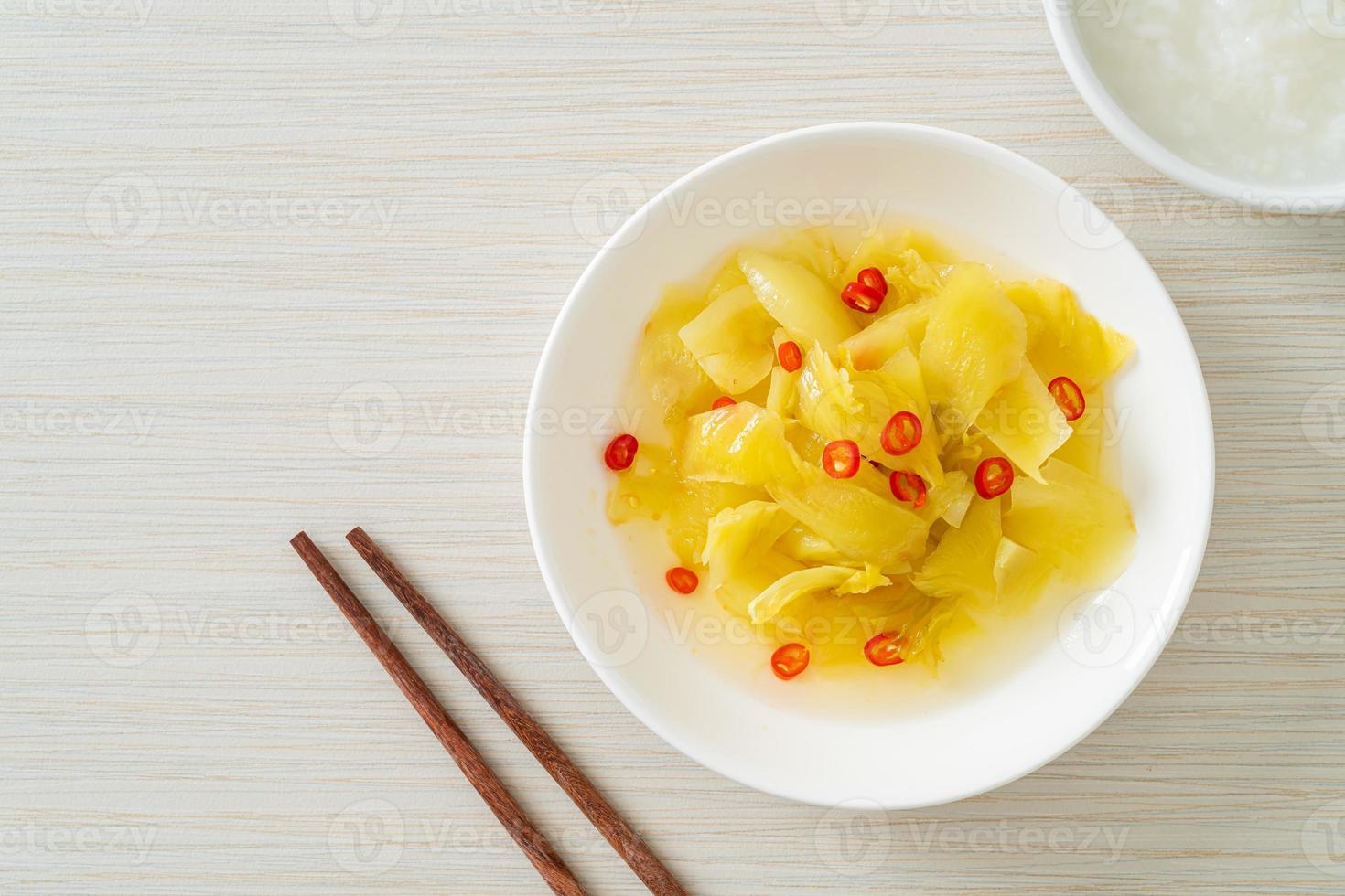 Spicy salad pickle cabbage or celery with sesame oil photo