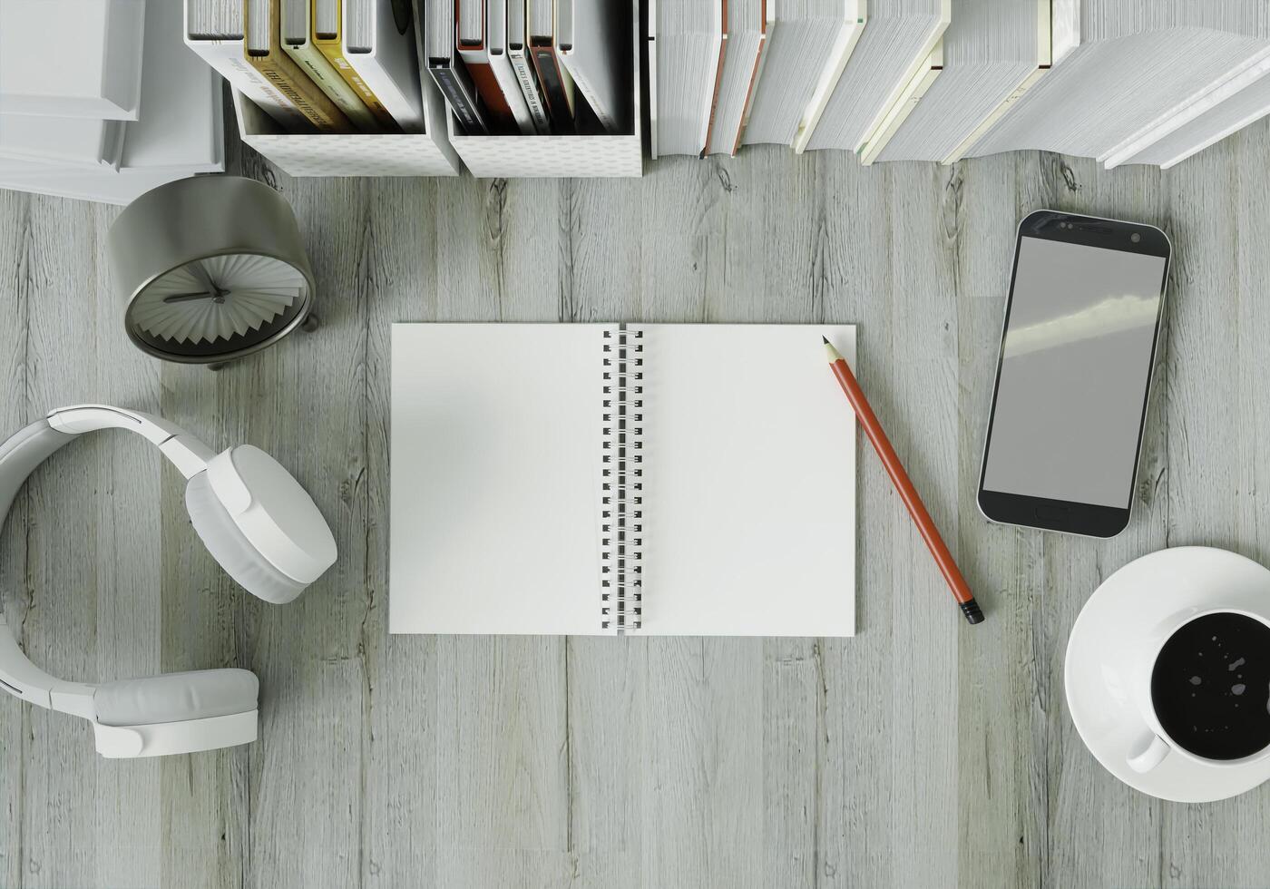 A working room with books placed on a white table with headphones photo