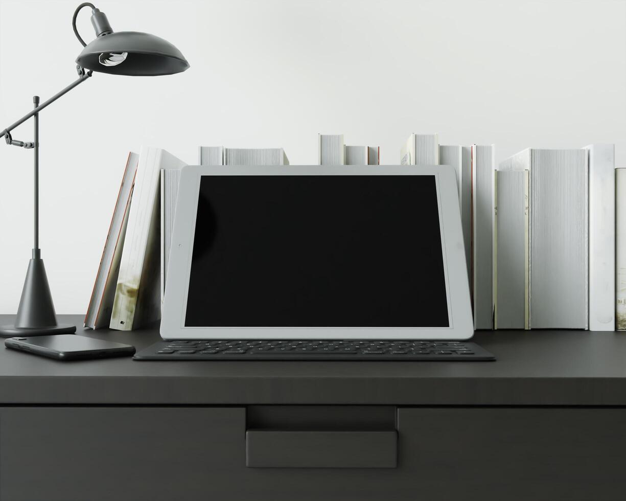 A working room with a laptop with a lamp placed on the table. photo