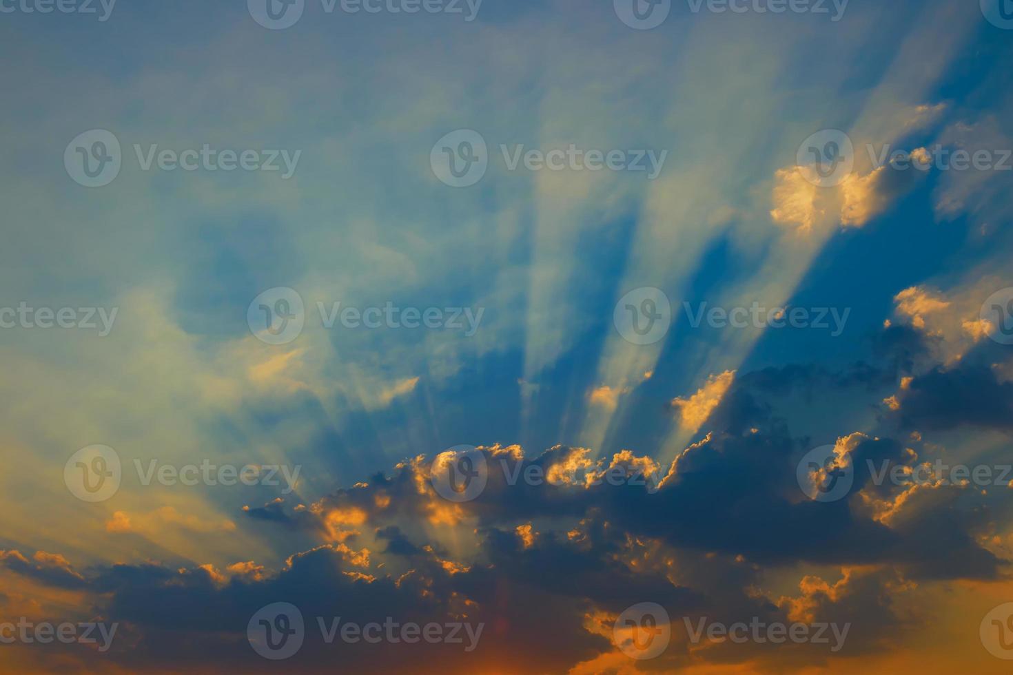 Beautiful sky with clouds and sun rays photo