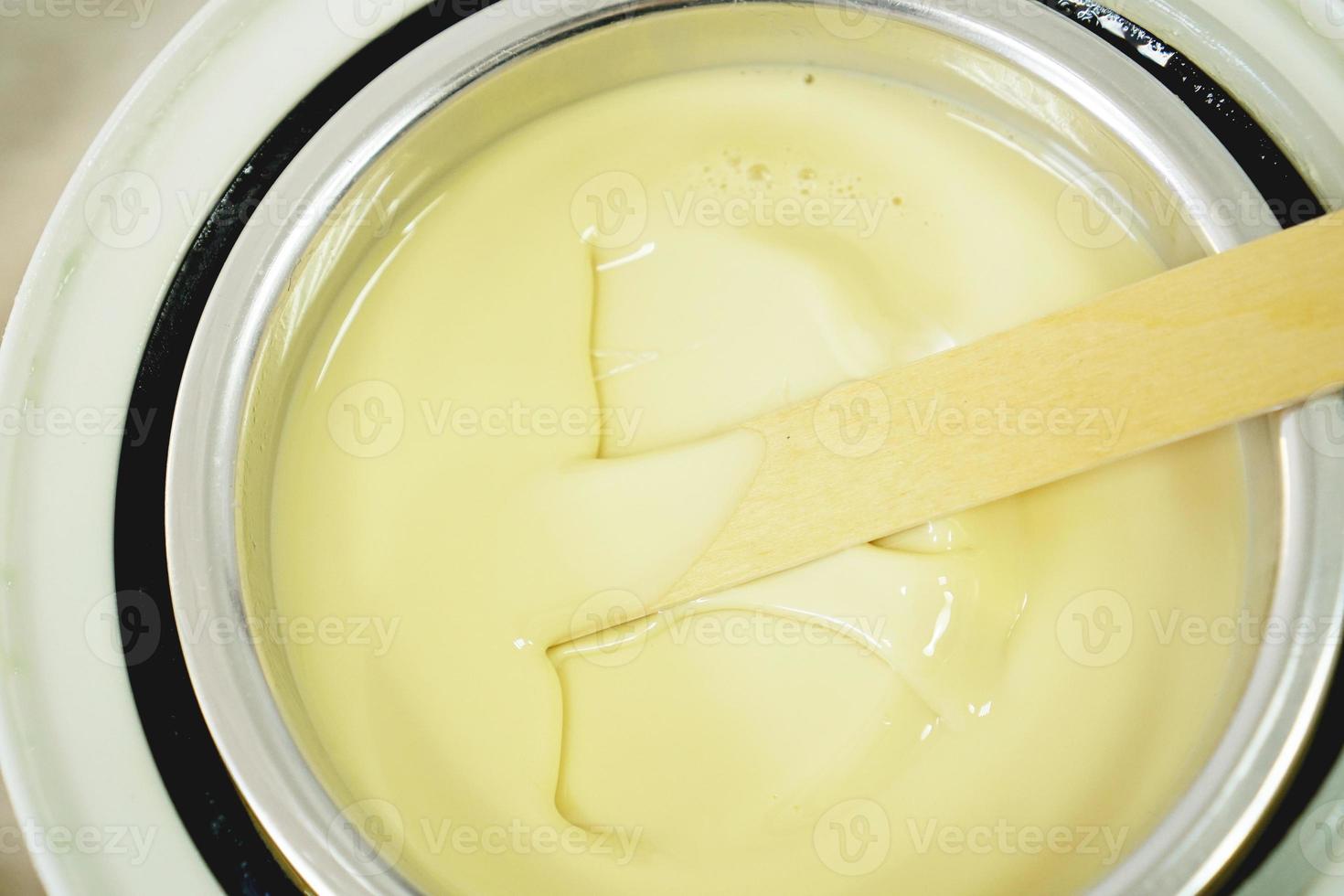 Preparation of wax for shugaring. Close-up wax for depilation photo