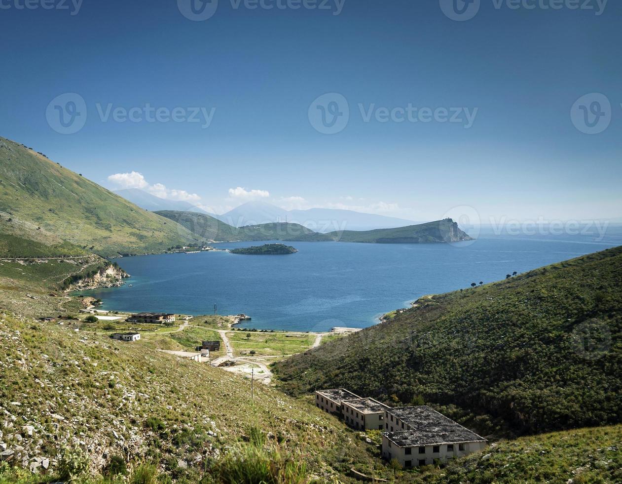 Ionian Mediterranean Sea coast beach landscape of Southern Albania north of Sarande on road to Vlore photo