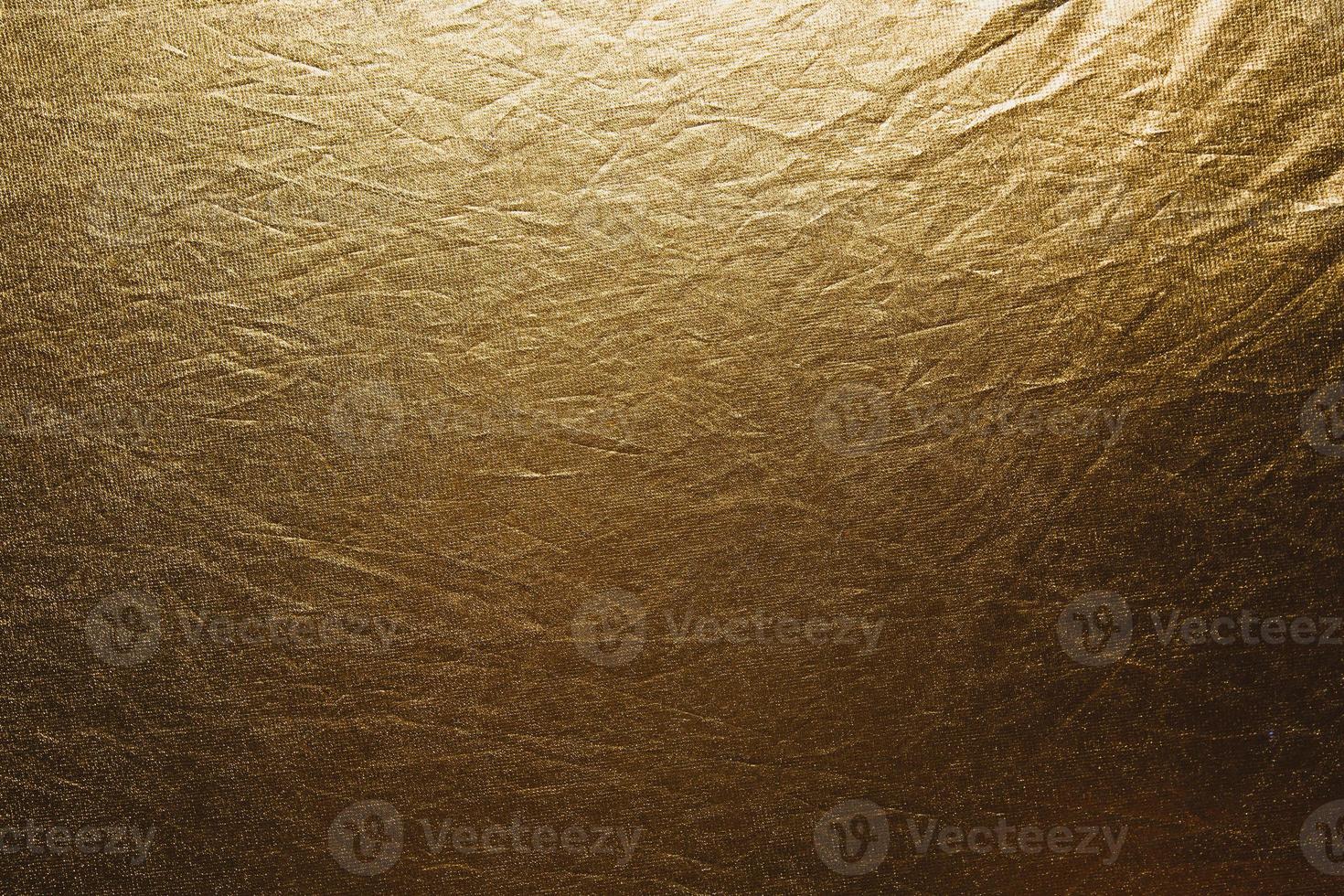 Gold fabric crumpled texture photo