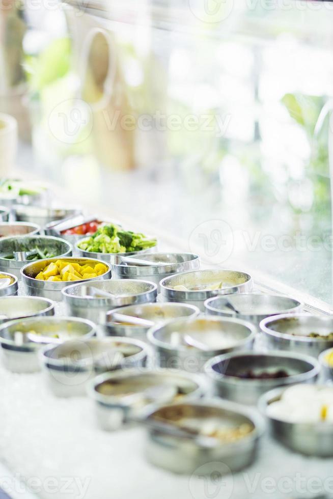 Salad bar buffet fresh mixed vegetable restaurant display detail photo