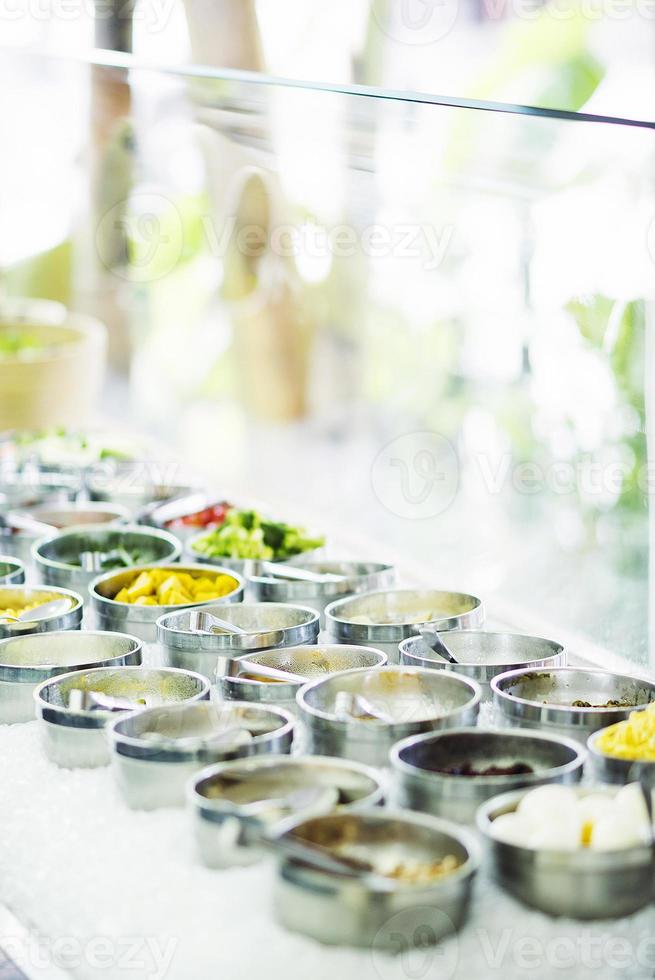 Salad bar buffet fresh mixed vegetable restaurant display detail photo