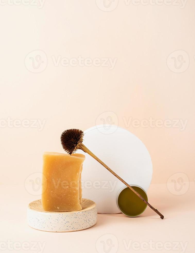 Creative art composition with soap and balsam, natural cosmetics photo