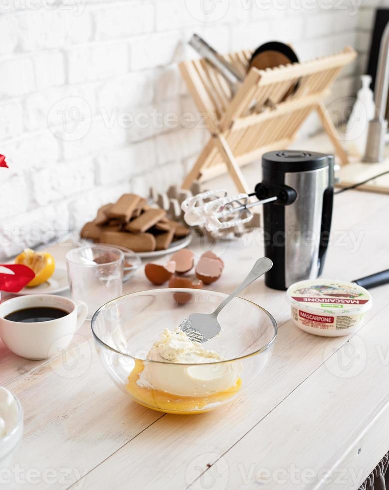 Kitchen interior with gift boxes, eggs and cooking unensils photo