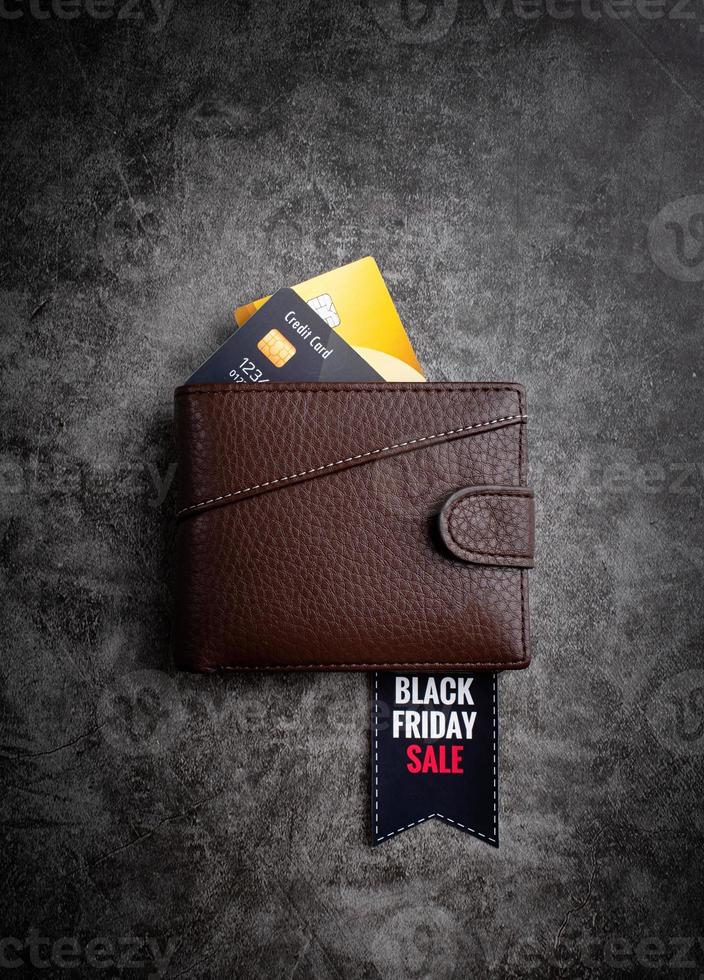 Browen leather wallet with text Black Friday Sale on a tag and credit photo
