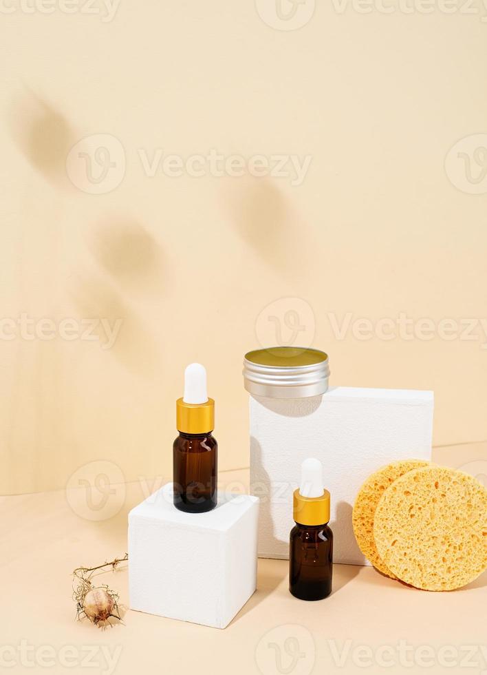 Brown bottles mockup for natural skincare cosmetics, spa accessories photo